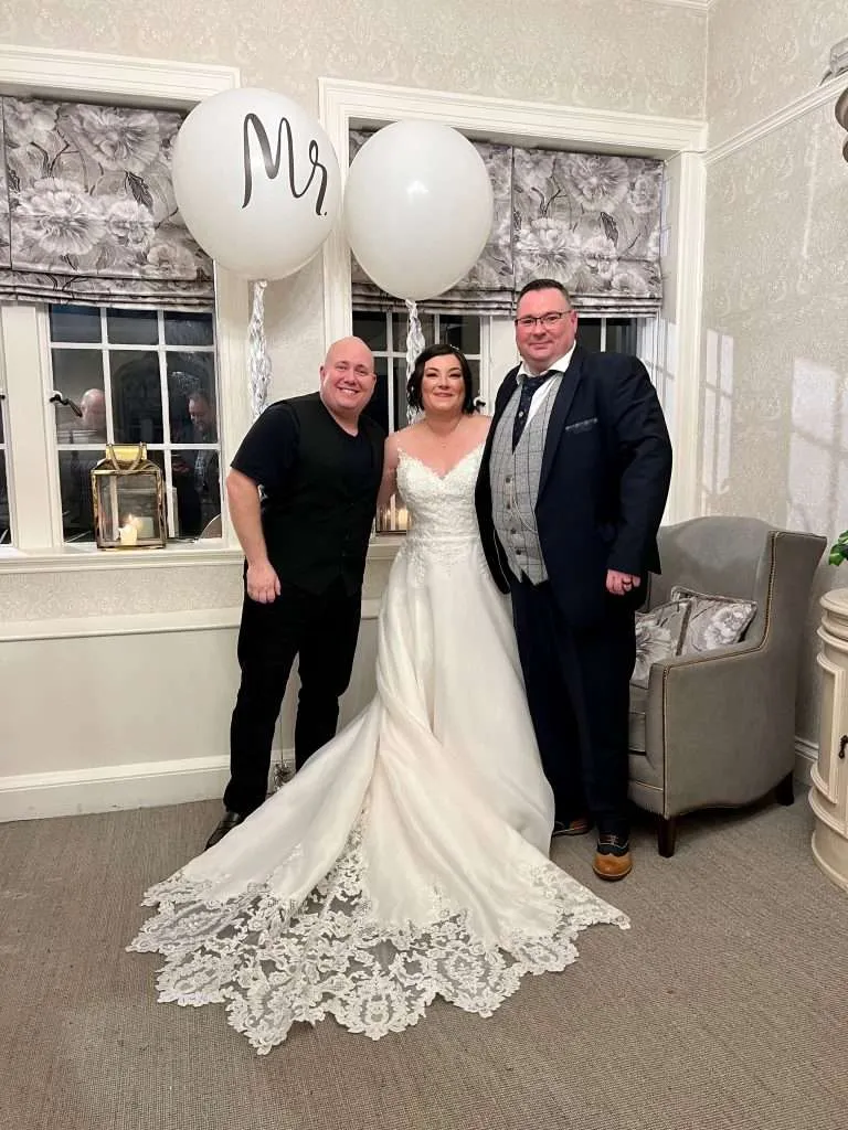 Mr and Mrs Coward 3 Mr and Mrs coward with Mark the Piano Guy at their wedding at Eaves Hall